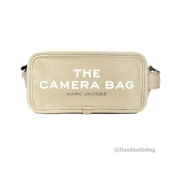 Beige Hypes Inventory camera bag crossbody with adjustable strap, stylish and functional shoulder bag for camera storage.