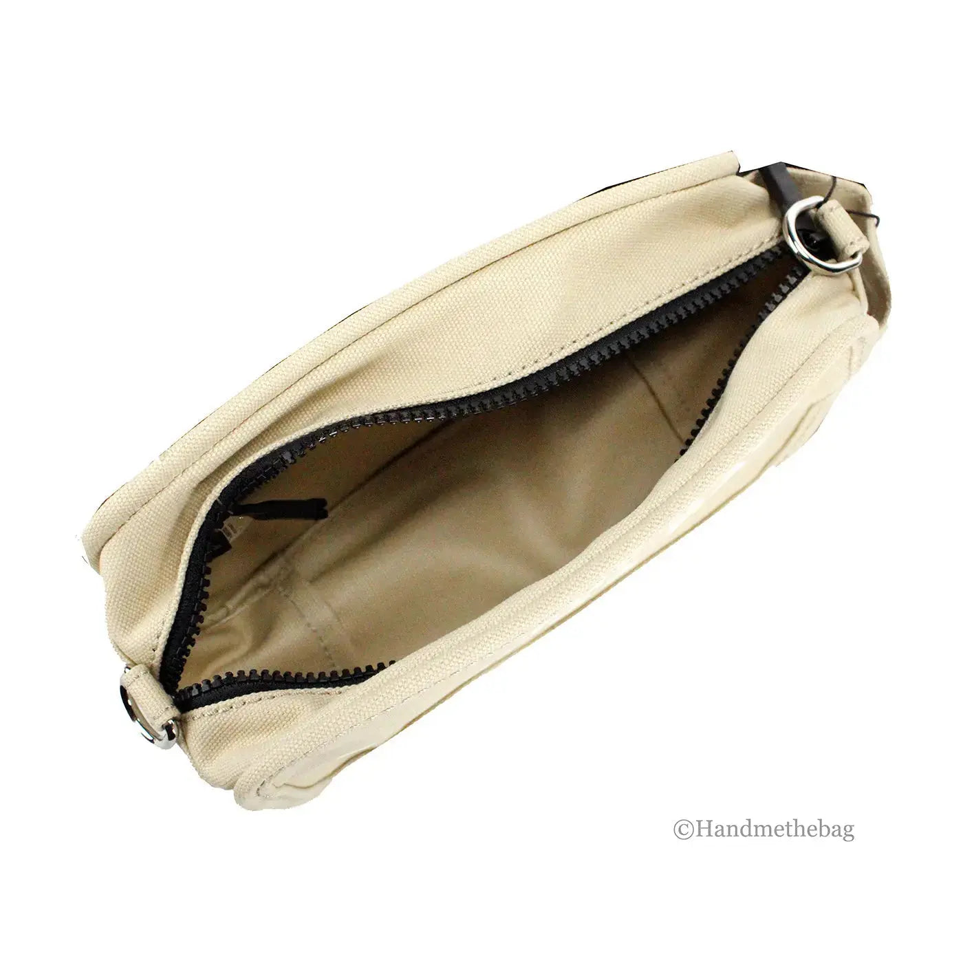 Beige Hypes Inventory camera bag with adjustable crossbody strap and stylish design, suitable for carrying camera gear.