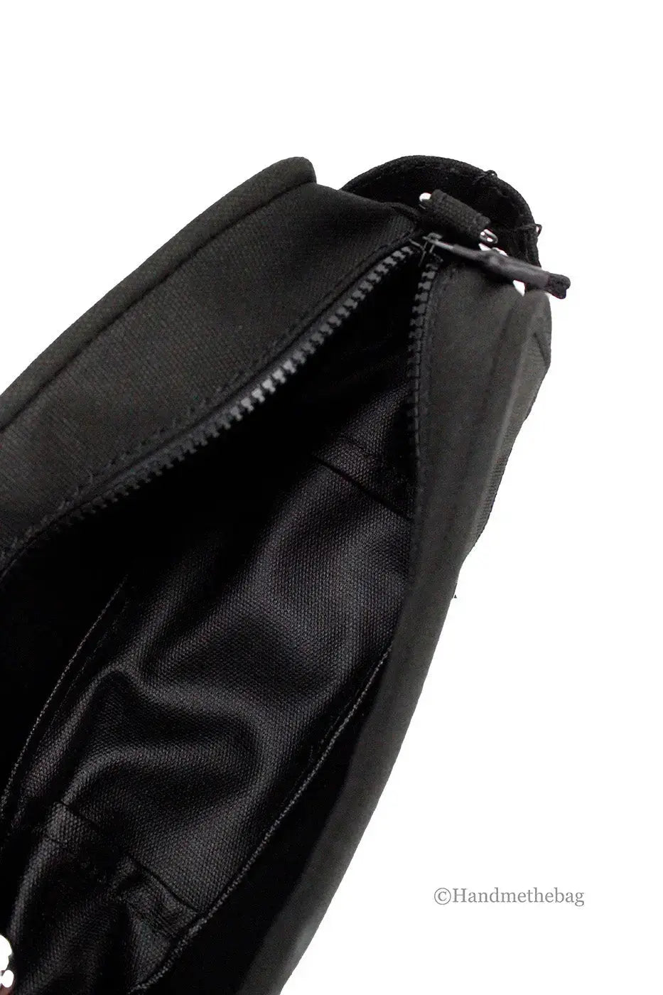 Black Hypes Inventory camera bag with adjustable strap, compact crossbody design ideal for carrying camera gear securely.