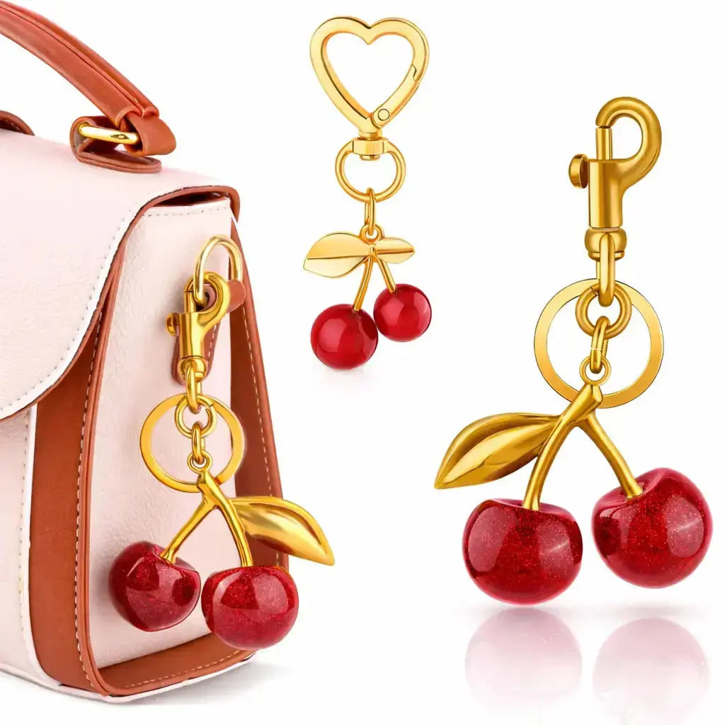 Red cherry-shaped bag charm and strawberry keychain for handbags, cute accessory by Hypes Inventory for women.