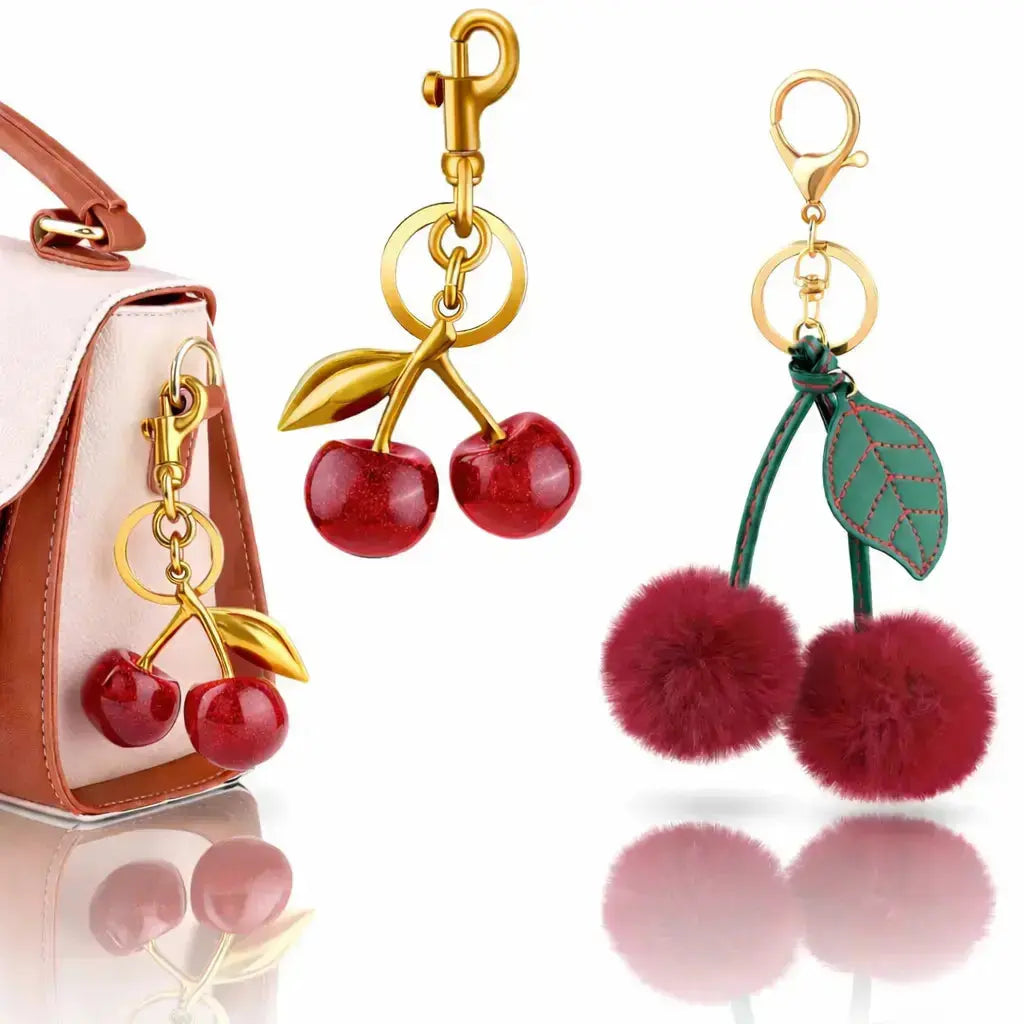 Red cherry purse charm keychain by Hypes Inventory, stylish handbag accessory featuring a cute cherry and strawberry design.