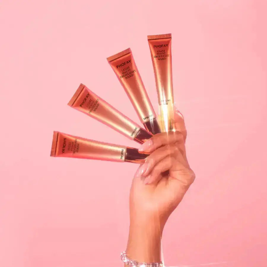Hypes Inventory PHOFAY Glow liquid highlighter wand with a sleek applicator, designed to add luminous shine to makeup looks.