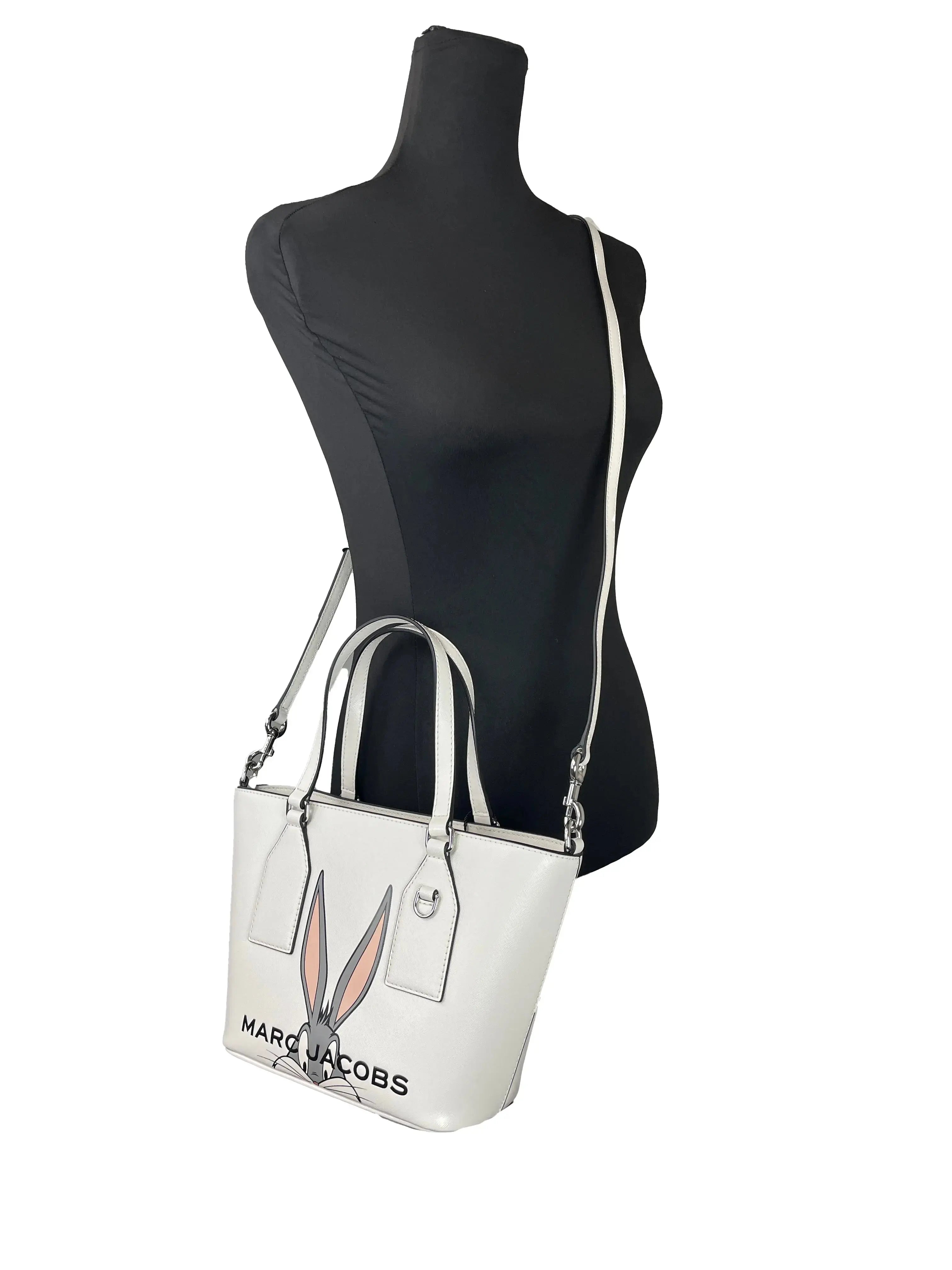 Marc Jacobs Bugs Bunny Dome Satchel Bag by Hypes Inventory, Looney Tunes leather crossbody bag with cartoon Bugs Bunny design.
