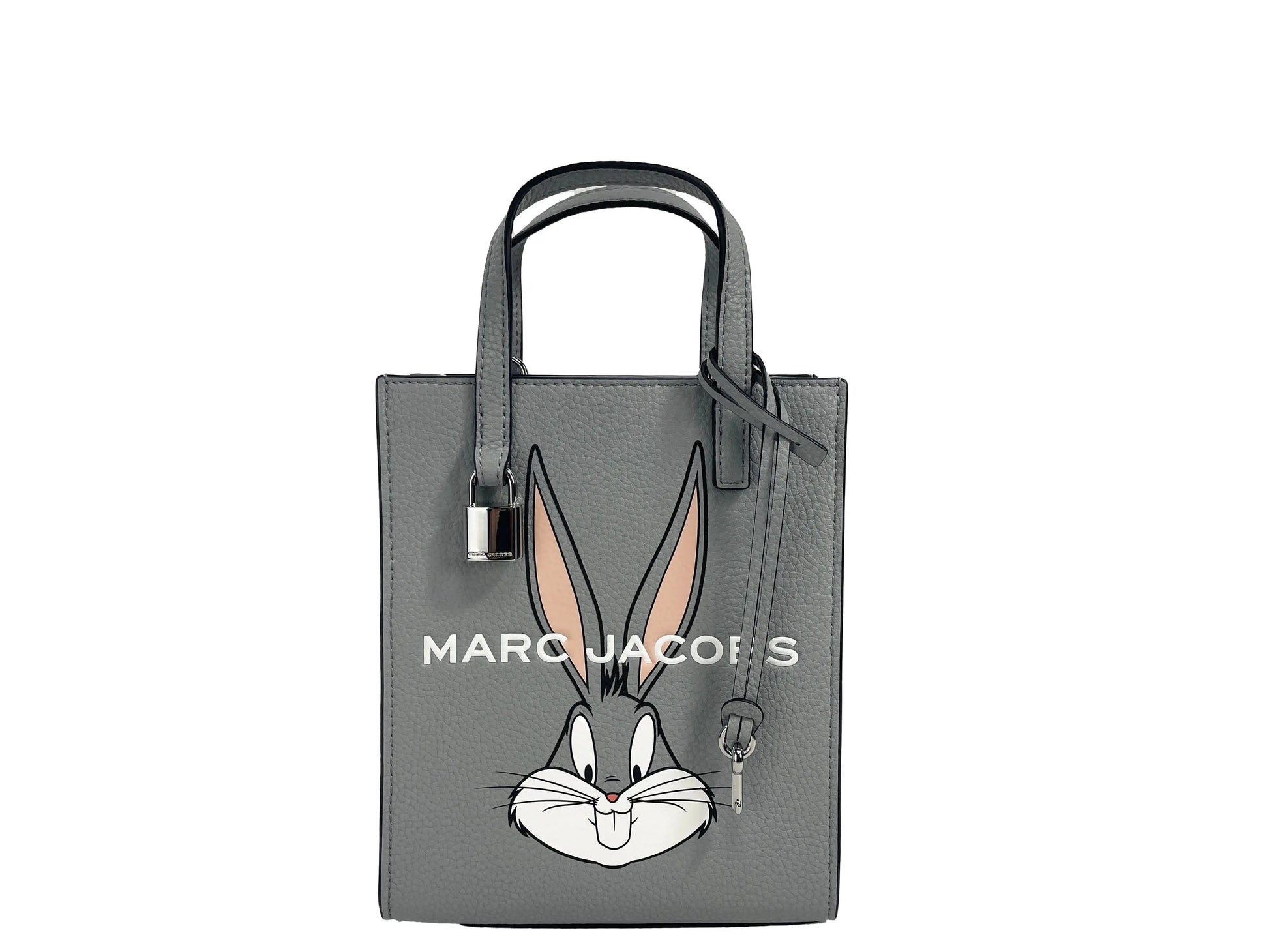 Marc Jacobs Bugs Bunny Looney Tunes leather crossbody bag with adjustable strap and Bugs Bunny graphic design.