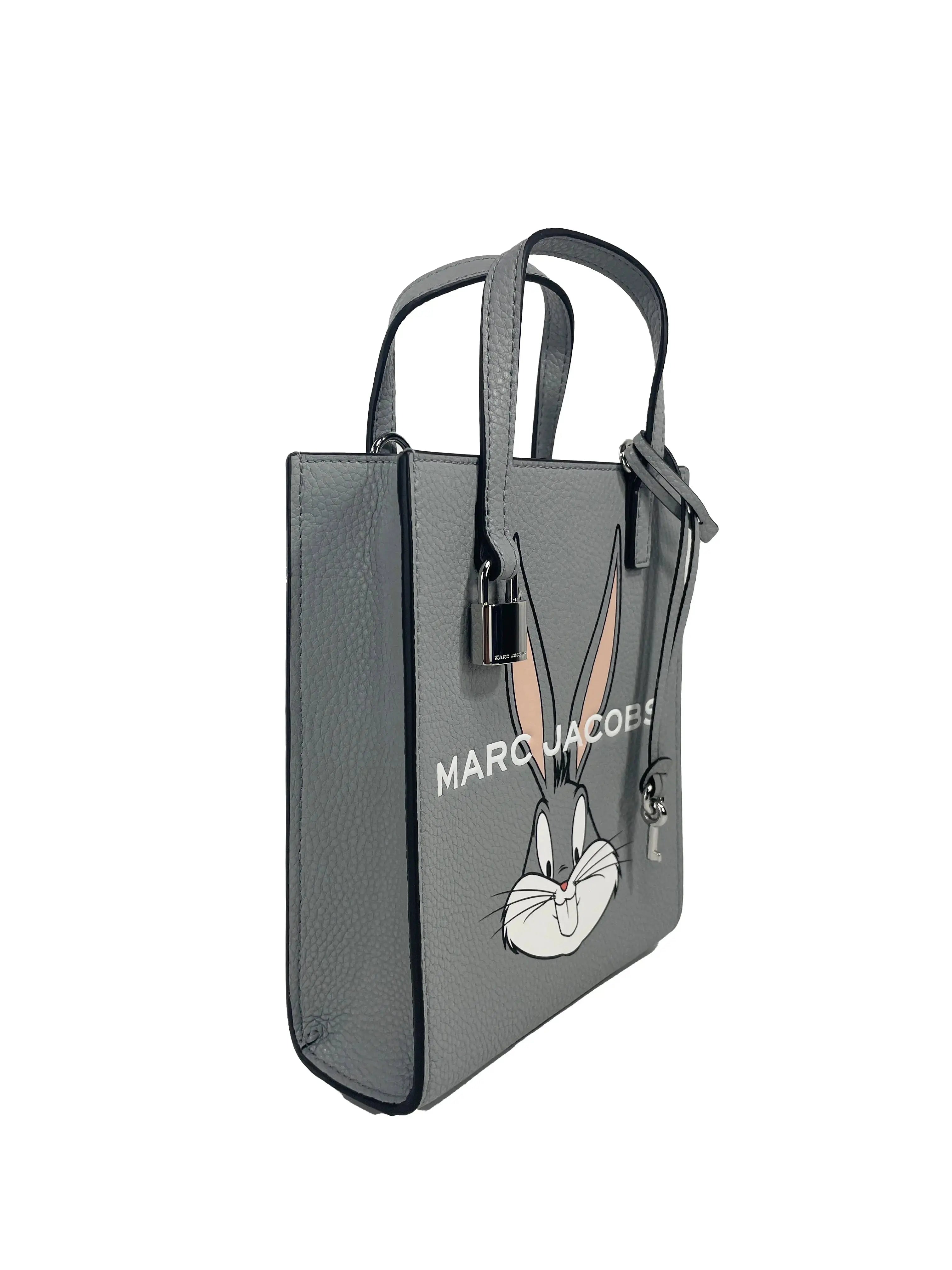 Marc Jacobs Bugs Bunny Grind Bag, a Looney Tunes leather crossbody tote with Bugs Bunny design, by Hypes Inventory.
