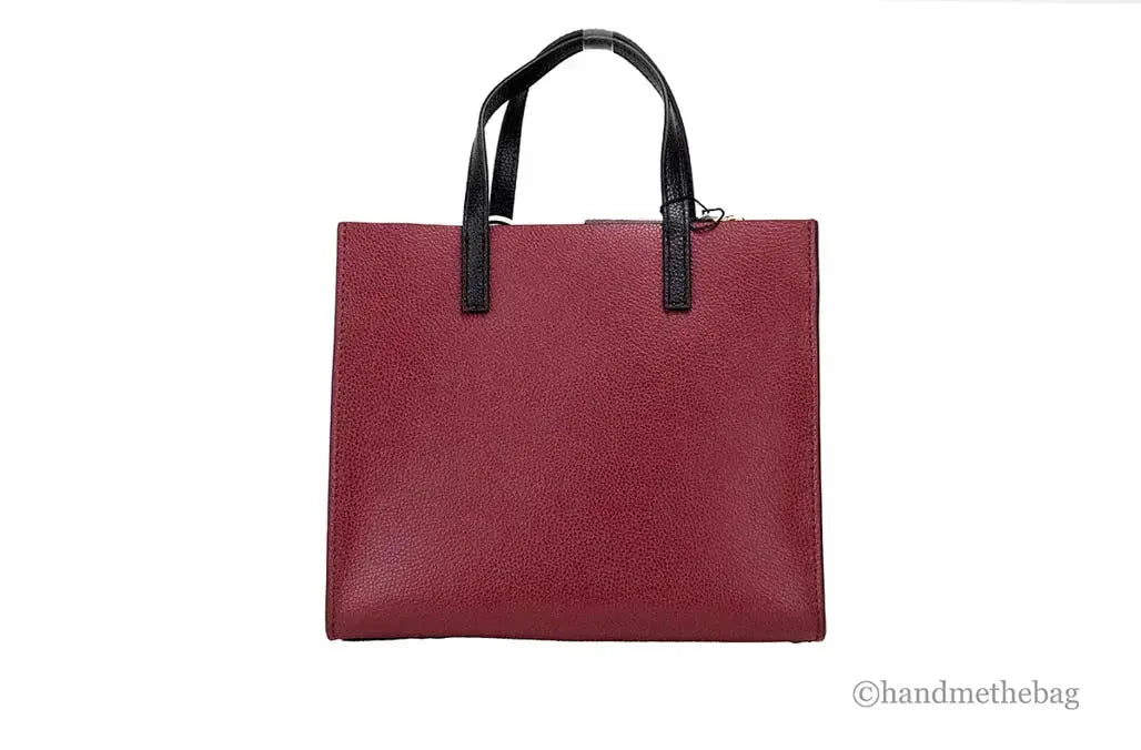 Marc Jacobs Grind Mini leather tote bag in pomegranate color block design, stylish crossbody bag from Hypes Inventory