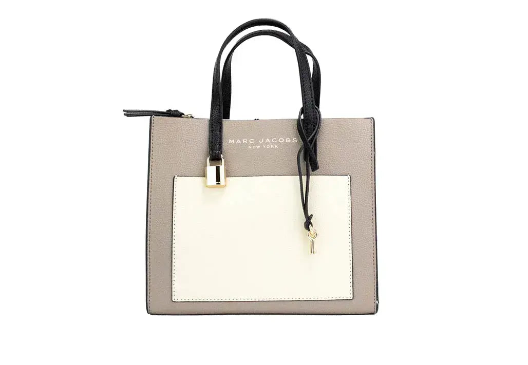 Marc Jacobs Mini Tote Leather bag with colorblock design, featuring a compact crossbody style in brown and tan leather.