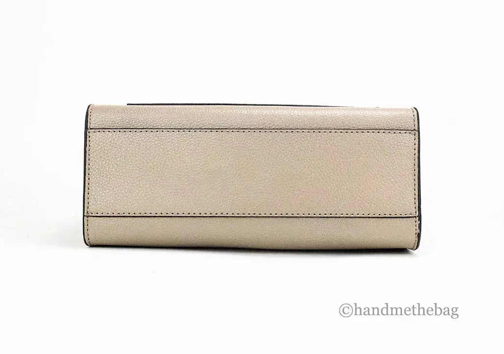 Marc Jacobs Mini Tote Leather in colorblock design, used as a stylish crossbody bag with a leather finish.
