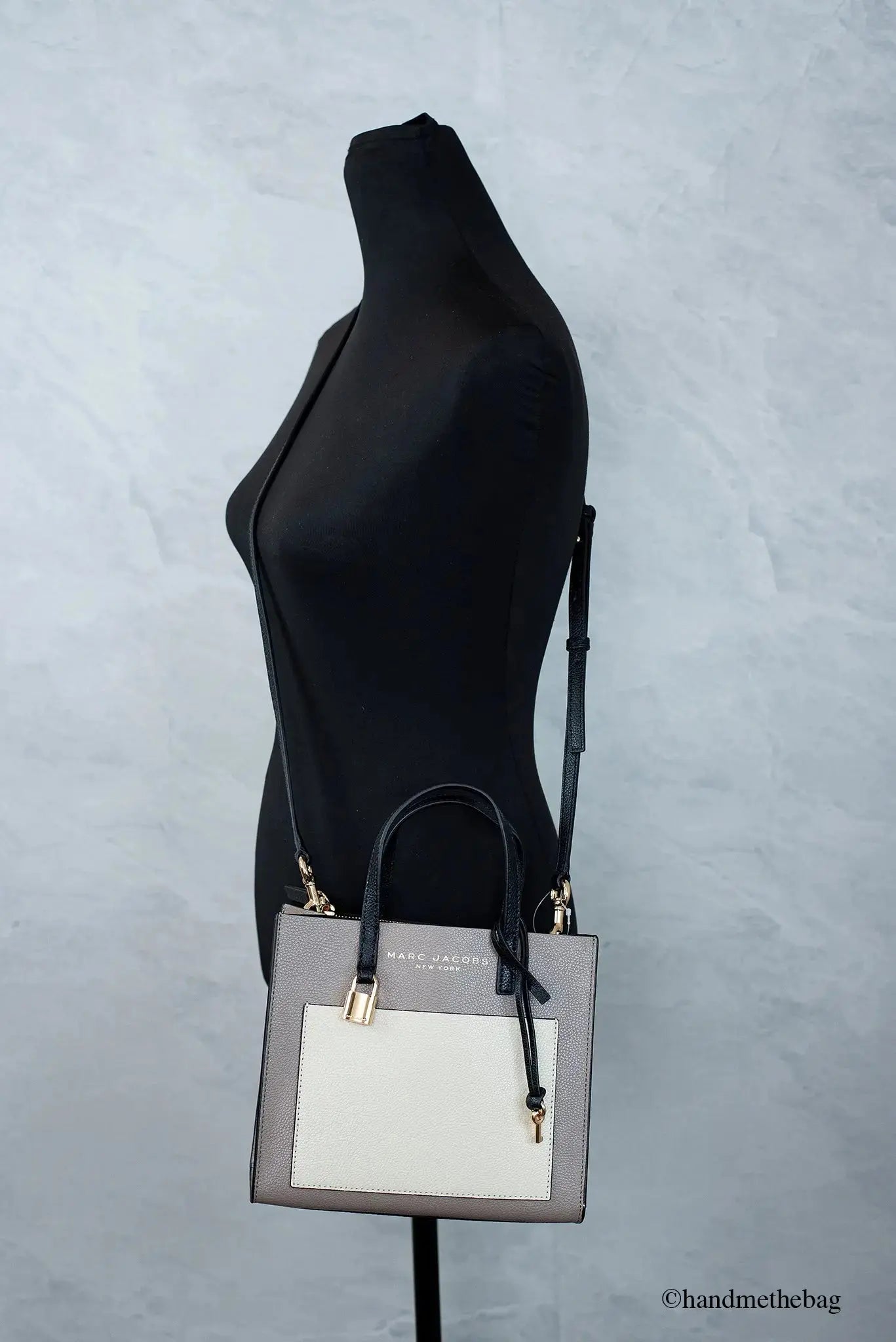 Marc Jacobs Mini Tote Leather in colorblock design, stylish crossbody bag with leather construction and versatile style.