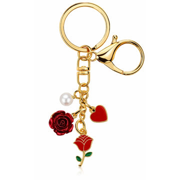 Gold and red rose bag charm keychain with pearl accents from Hypes Inventory, featuring a floral pendant and elegant design.