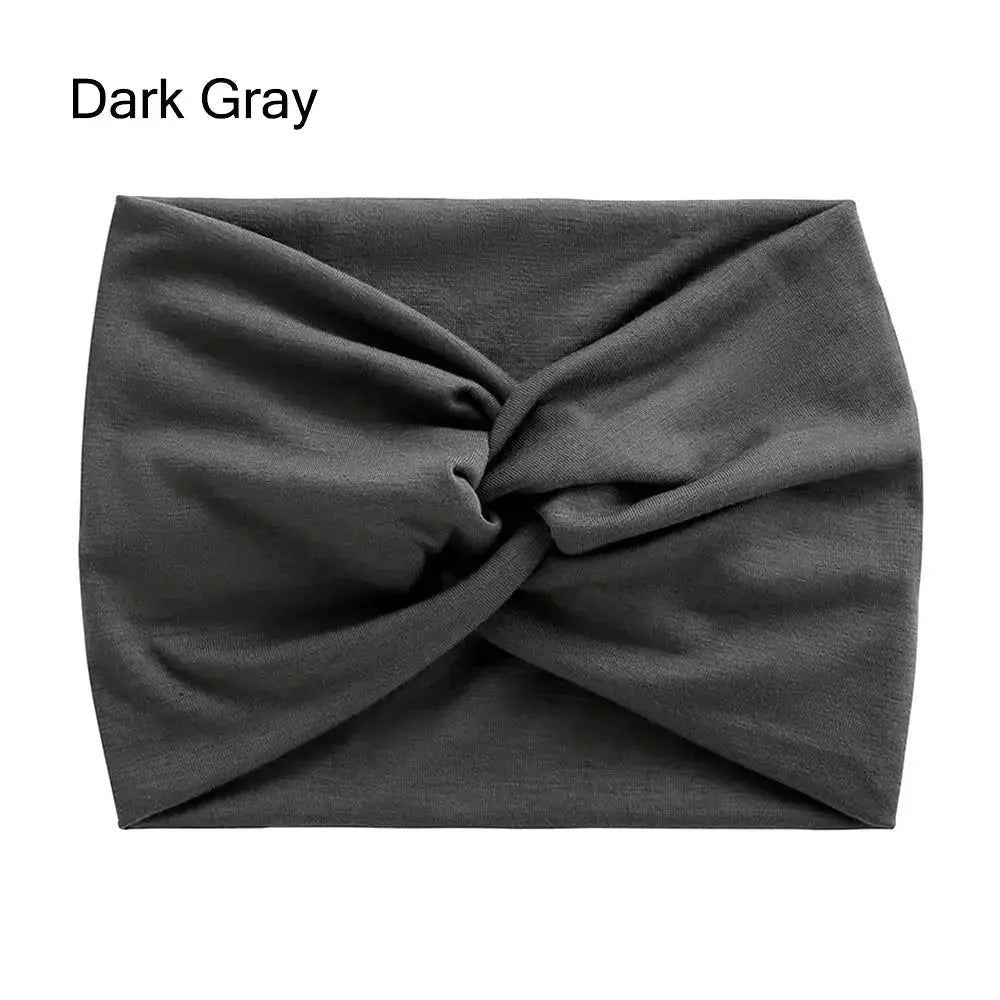 Wide stretchy turban headband for women, stylish hair accessory by Hypes Inventory, offers all-day comfort and versatile styling.