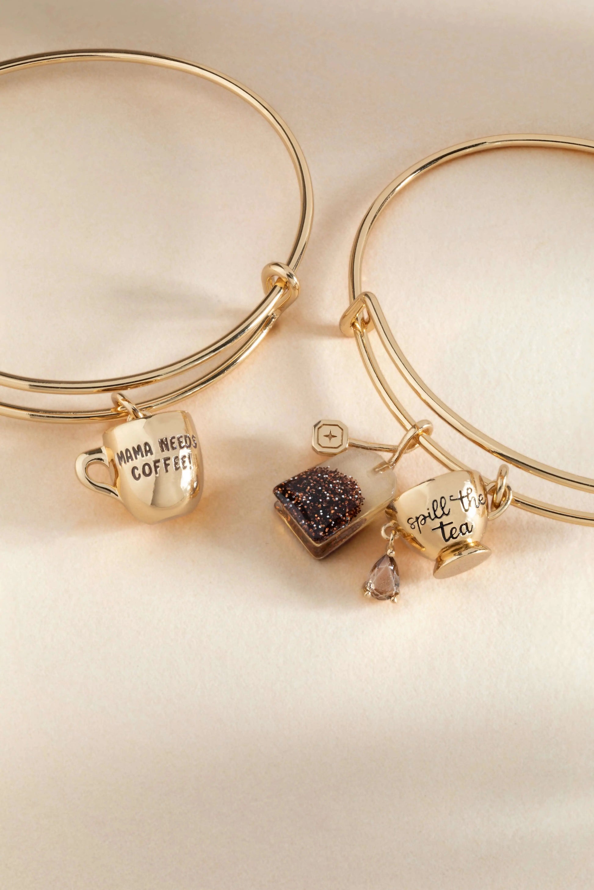 ALEX AND ANI tea bag charm bangle bracelet featuring a spring-themed coffee charm on a sleek metal bracelet.