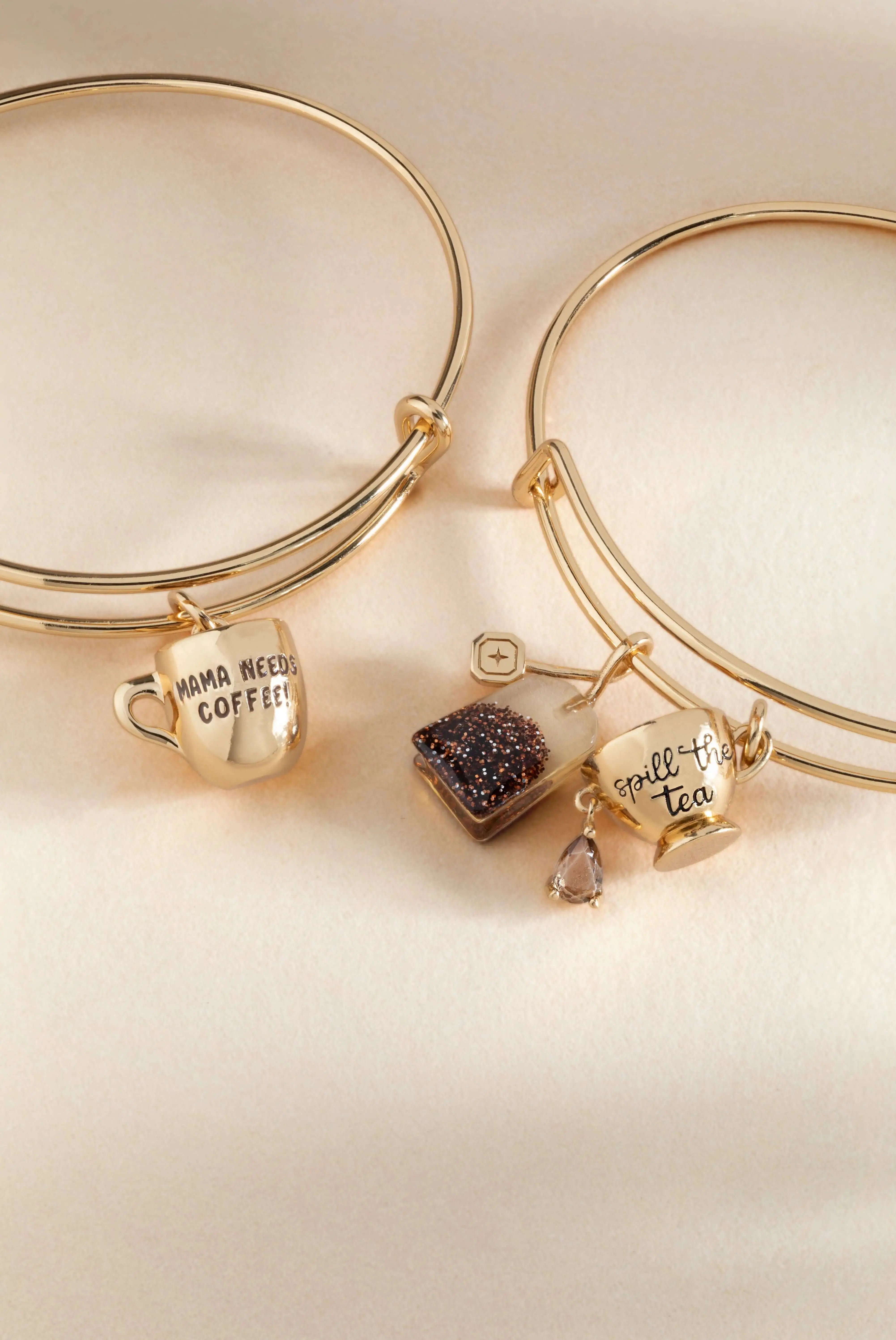 ALEX AND ANI tea bag charm bangle bracelet featuring a spring-themed coffee charm on a sleek metal bracelet.