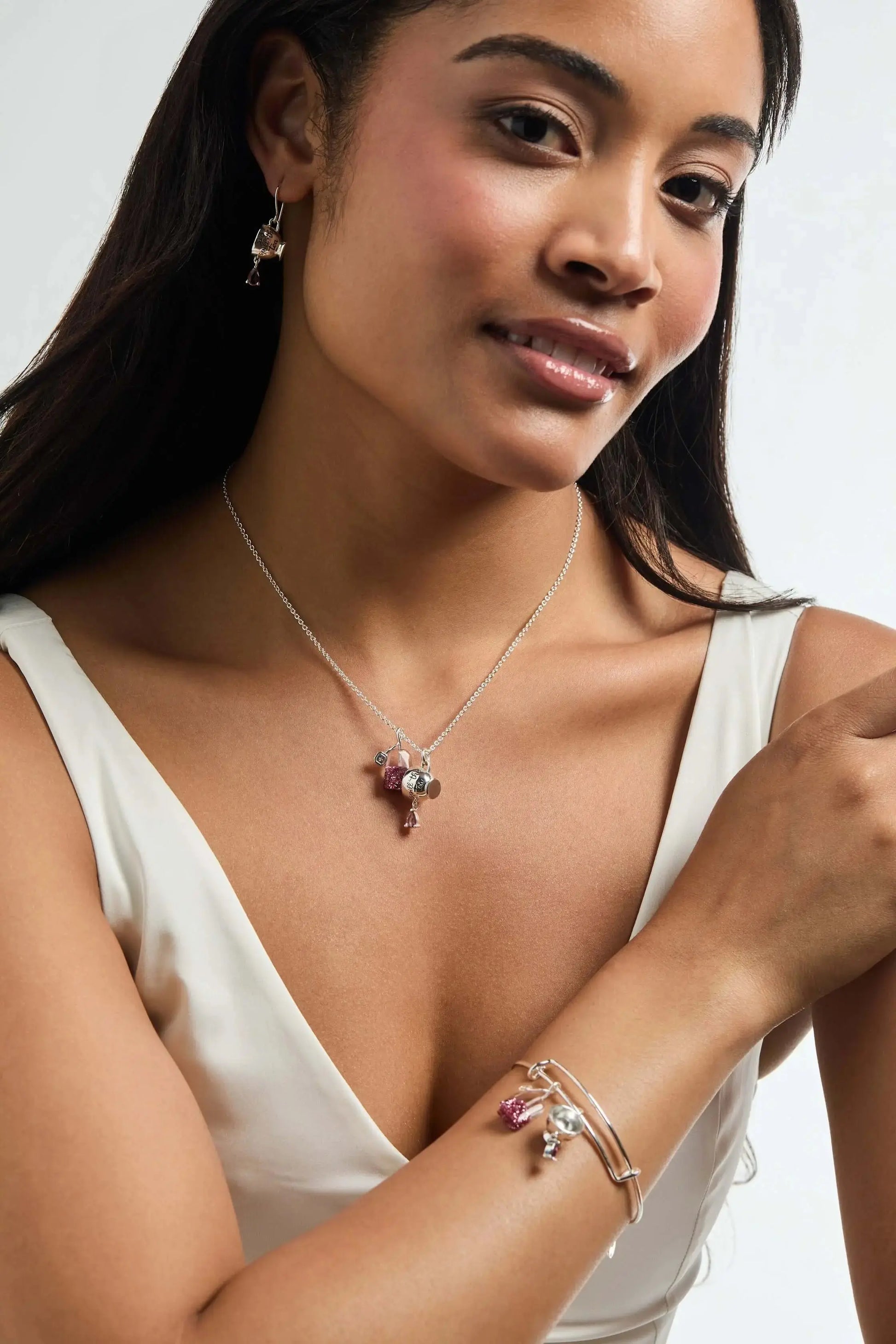 ALEX AND ANI fall-themed tea bag charm bracelet with autumn-colored charms and a sleek bangle design.