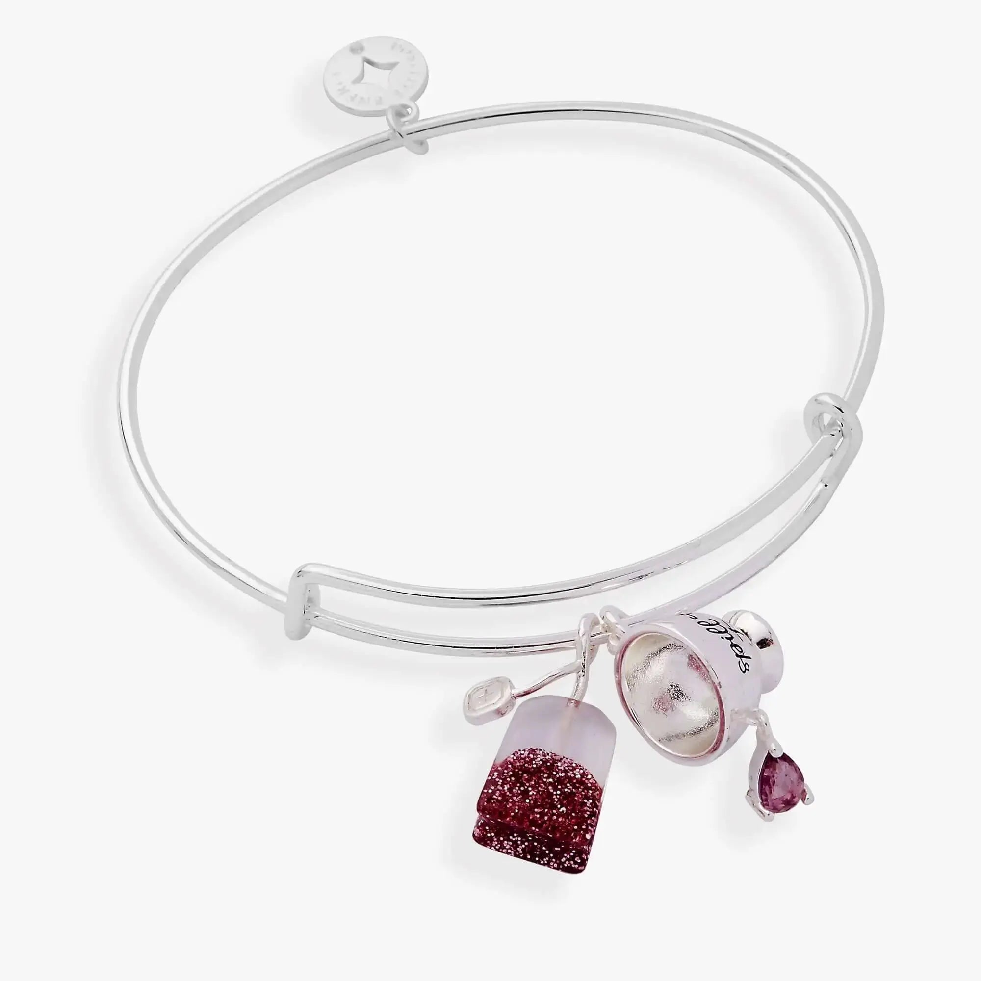 ALEX AND ANI spill-the-tea duo charm bracelet featuring a tea bag and cup charm on a silver-tone bangle.