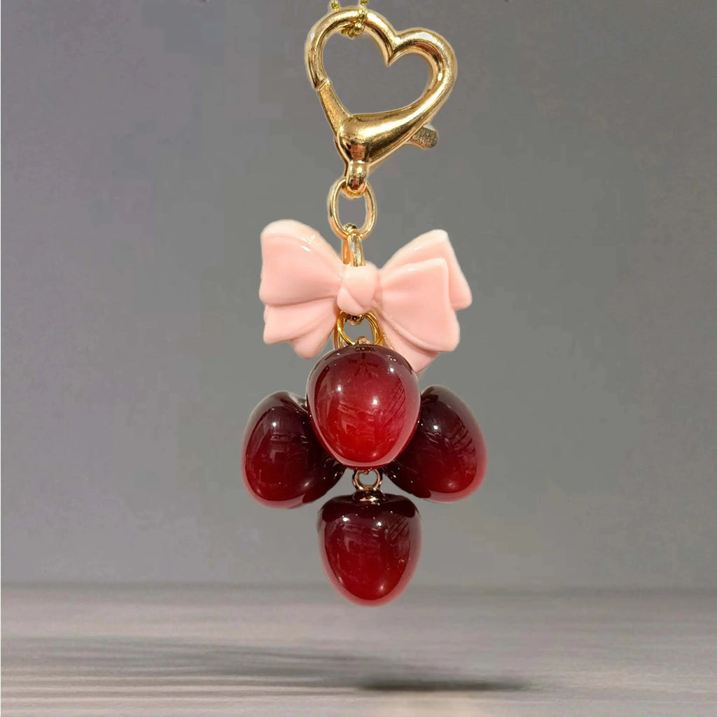 Deluxe Cherry Charm - Tumbler Handle Charm featuring a heart clasp and bow with decorative cherry accents.