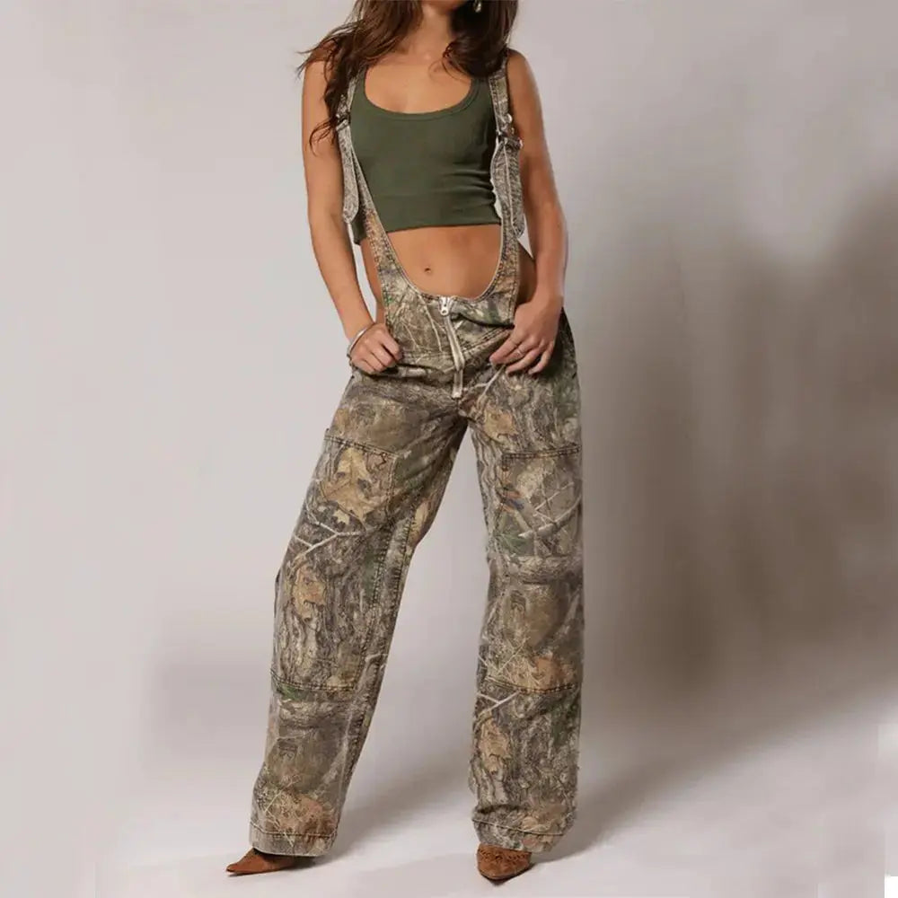 Black Y2K denim overalls for women by Flairé™ with a zip front, loose fit, and front pockets, perfect for casual styling.