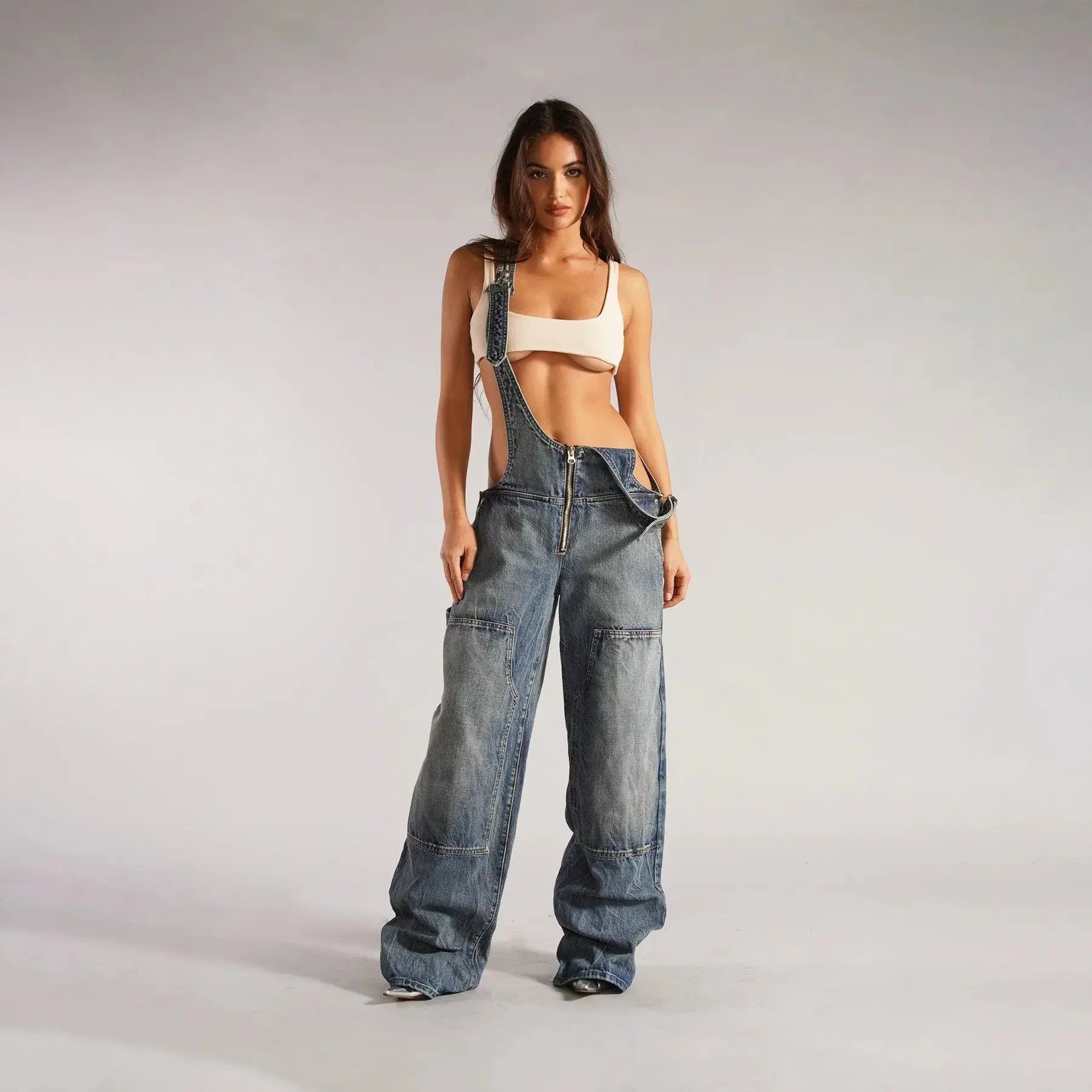 Black Y2K denim overalls for women by Flairé™, loose fit zip front jumpsuit with front pockets and casual style.