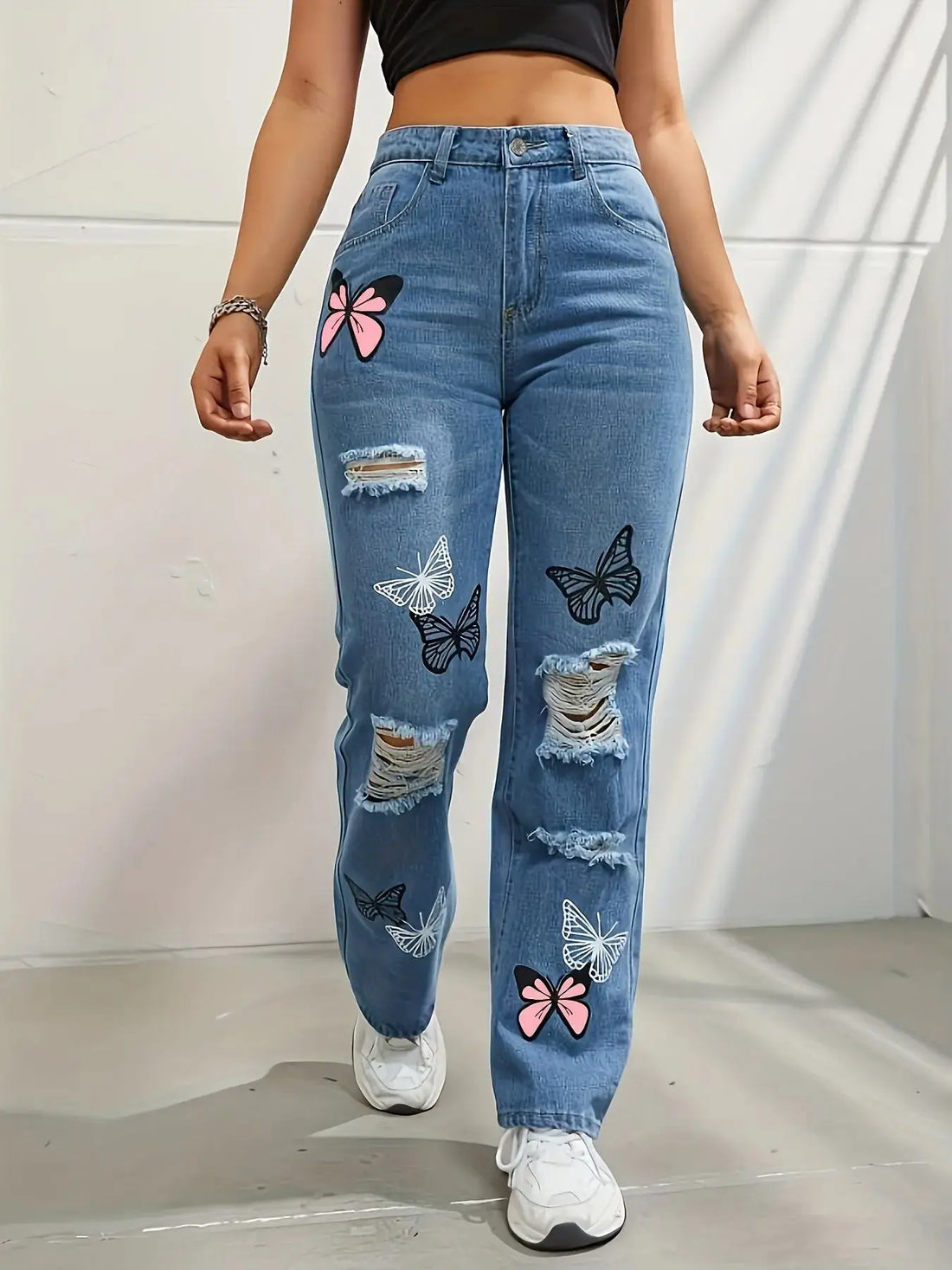 Flairé™ Butterfly print high waist distressed straight leg denim jeans, featuring butterfly patterns and distressed details.