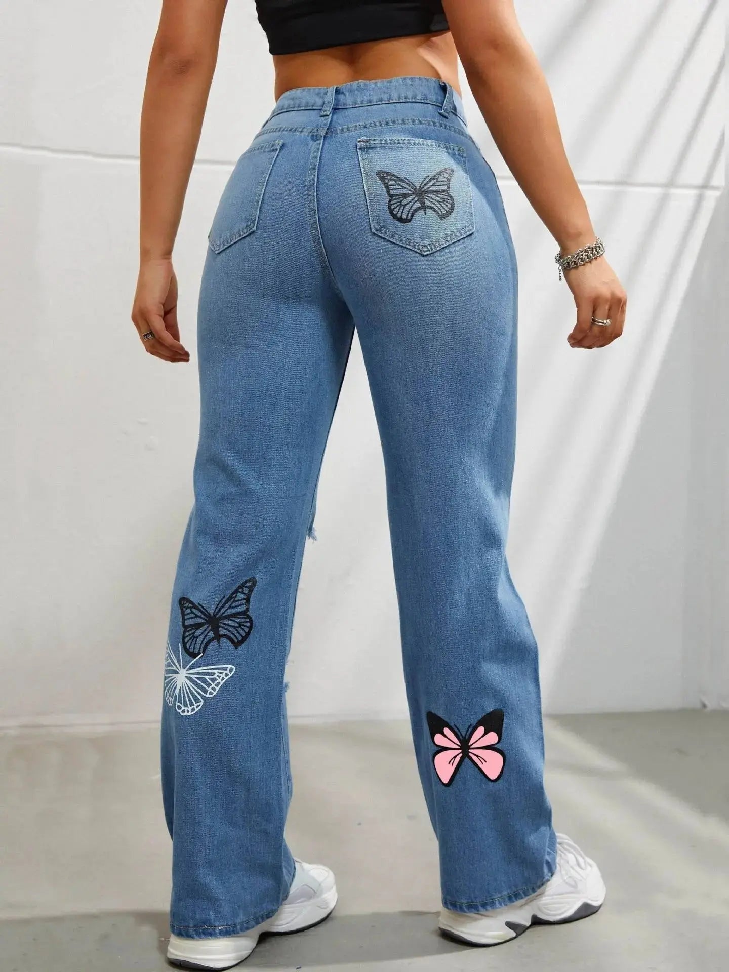 Flairé™ Butterfly Print high waist distressed straight leg denim jeans with rips and faded details, casual and stylish.