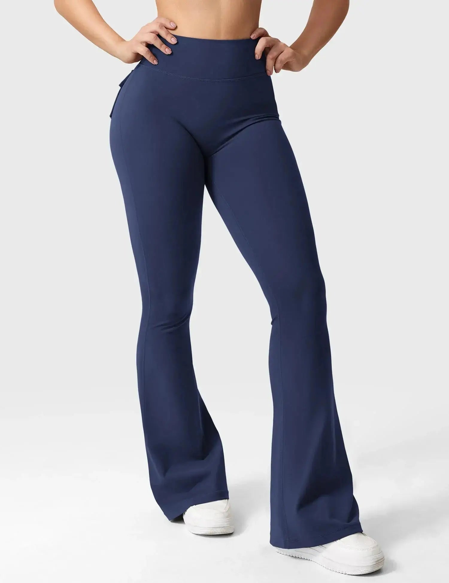 Light gray Flairé™ 30-inch high-waisted flare leggings with pockets, designed for yoga and athleisure activities.