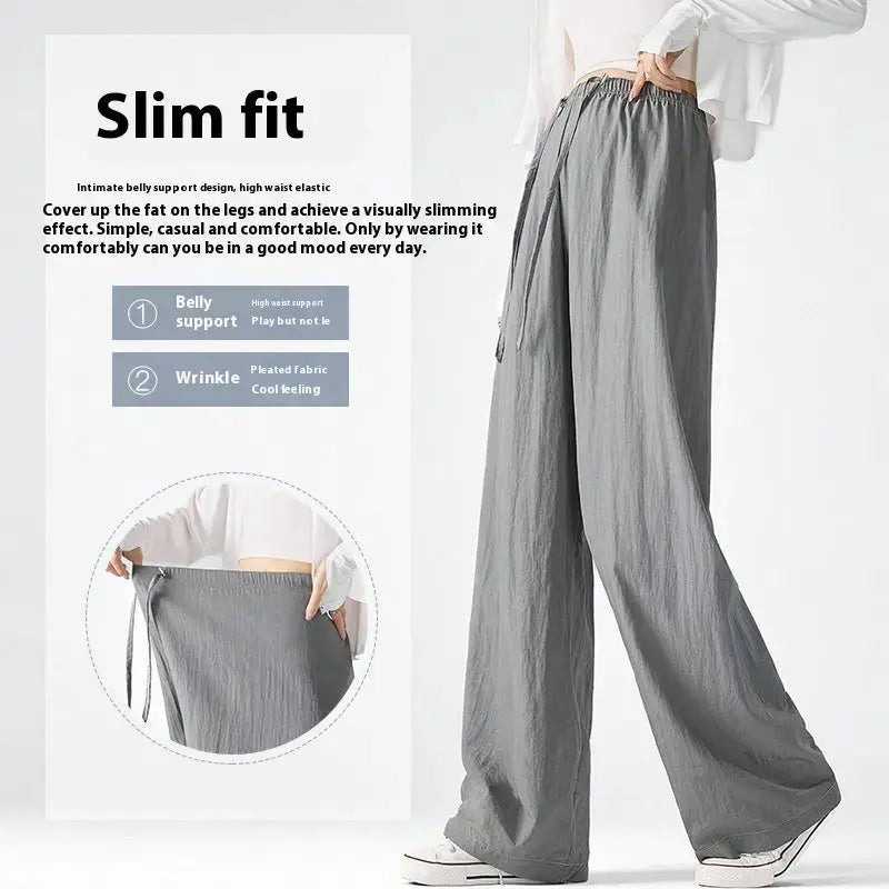 Dark gray Flairé™ high waist wide leg pants for women, relaxed fit minimalist trousers with a flowy, comfortable silhouette.