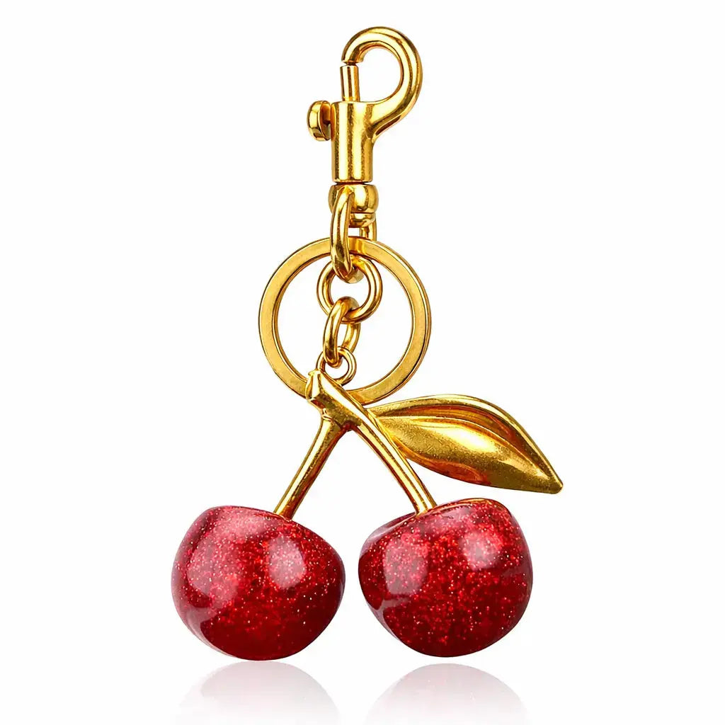 Red cherry purse charm keychain by Hypes Inventory, featuring a cute strawberry design, perfect for handbags.