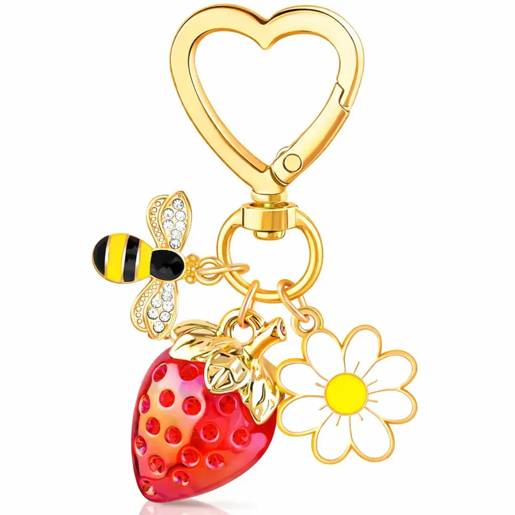 Red cherry bag charm and strawberry keychain by Hypes Inventory, perfect for handbags and as a cute gift for women.