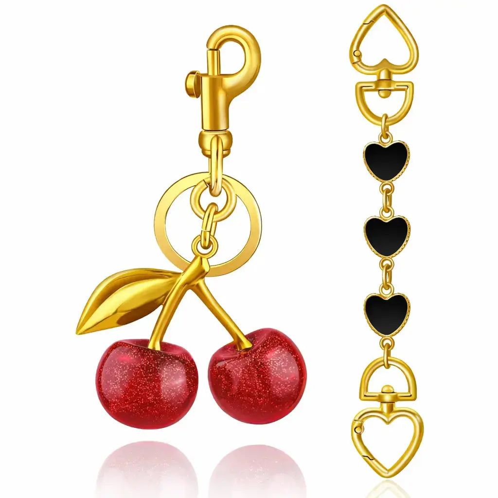 Red cherry purse charm keychain by Hypes Inventory, featuring a cute cherry and strawberry design for handbags and gifts.