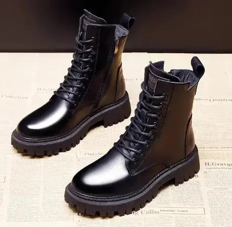 Delphine black leather winter boots for women by Hypes Inventory, featuring a British Martin style with sturdy soles and ankle height.