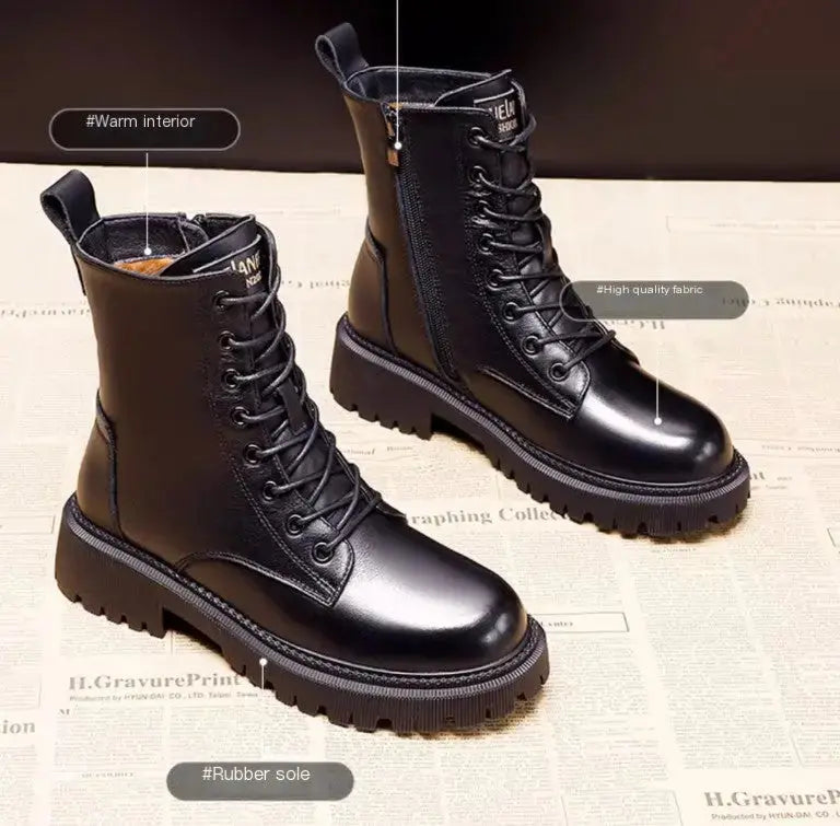 Black leather winter boots for women featuring a British Martin style by Hypes Inventory, showcasing sturdy design and chic detailing.