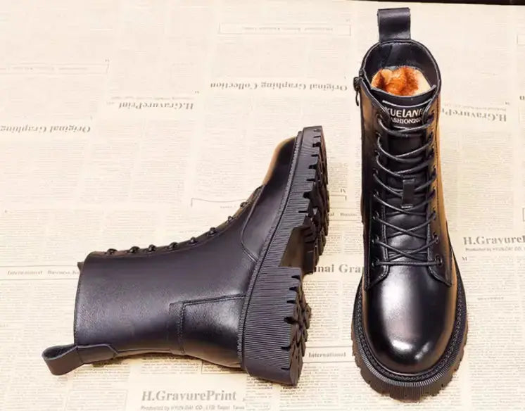 Delphine black leather winter boots for women with British Martin style, featuring sturdy soles and sleek design by Hypes Inventory.
