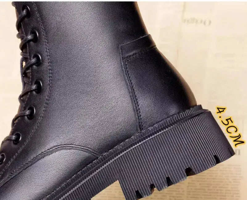 Black leather winter boots for women by Hypes Inventory, British Martin style, featuring a sleek design and sturdy sole.