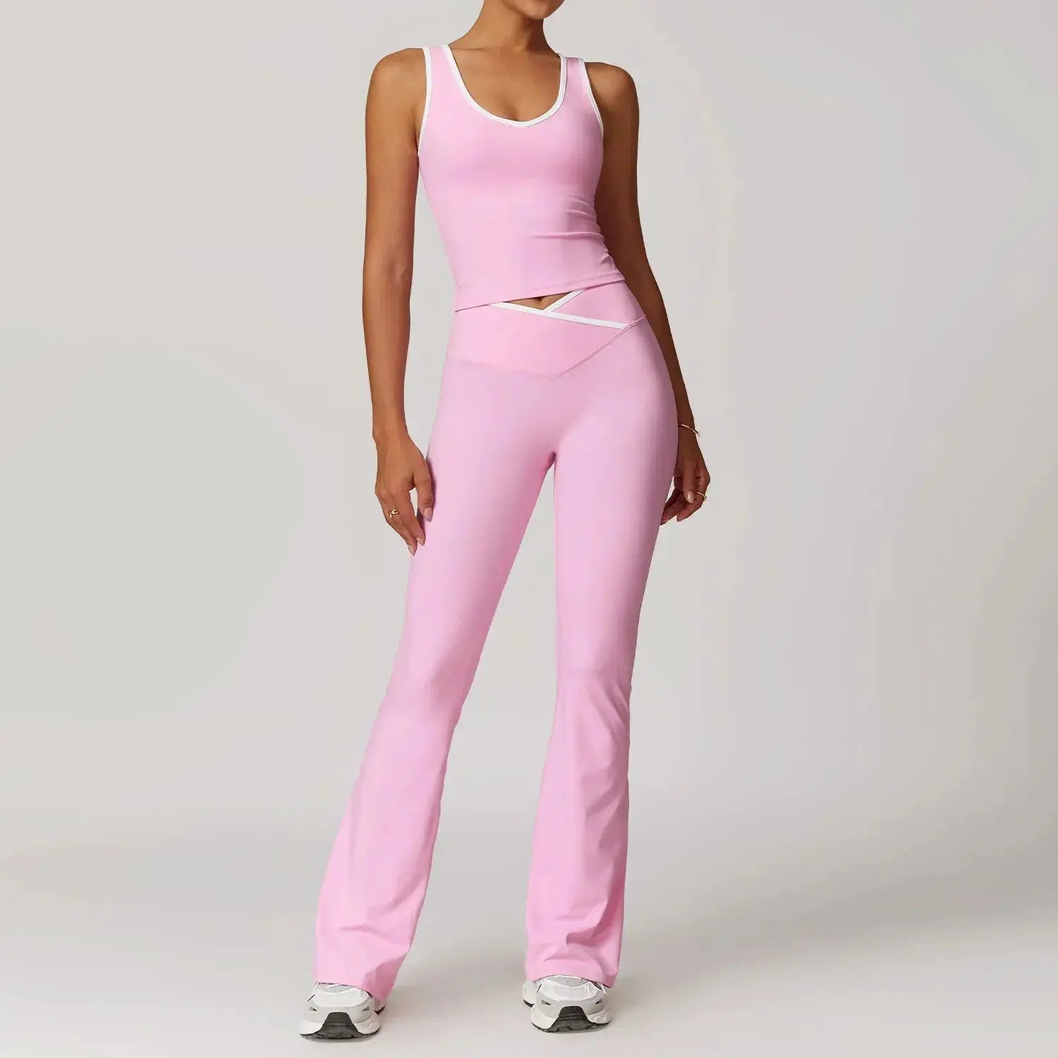 Women’s yoga set featuring high-waist leggings and a sports bra from Flaire™ by Hypes Inventory, ideal for fitness and workout sessions.