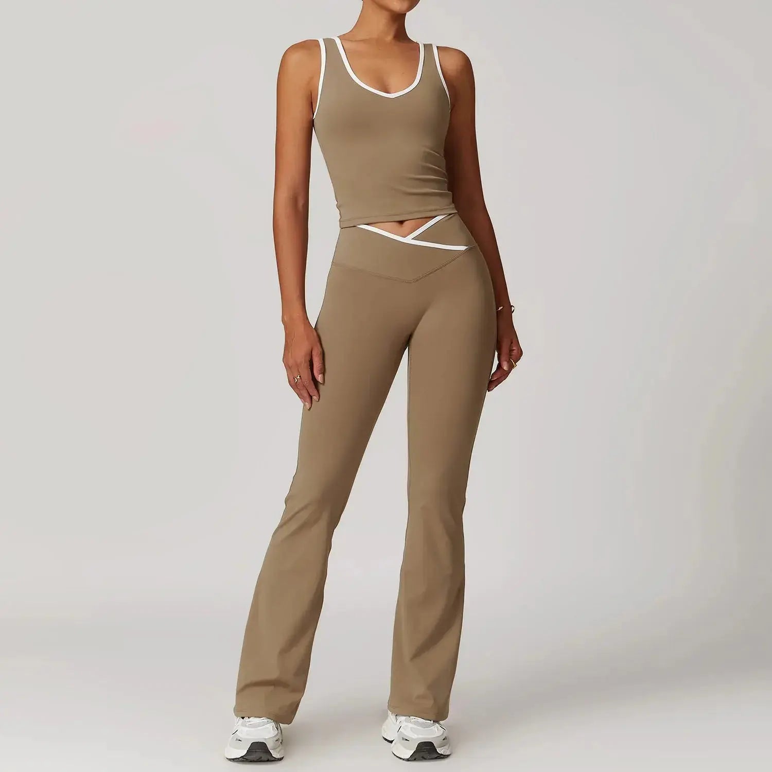 Women’s high waist yoga set by Flaire™ from Hypes Inventory, featuring a stylish workout top and matching leggings for fitness.