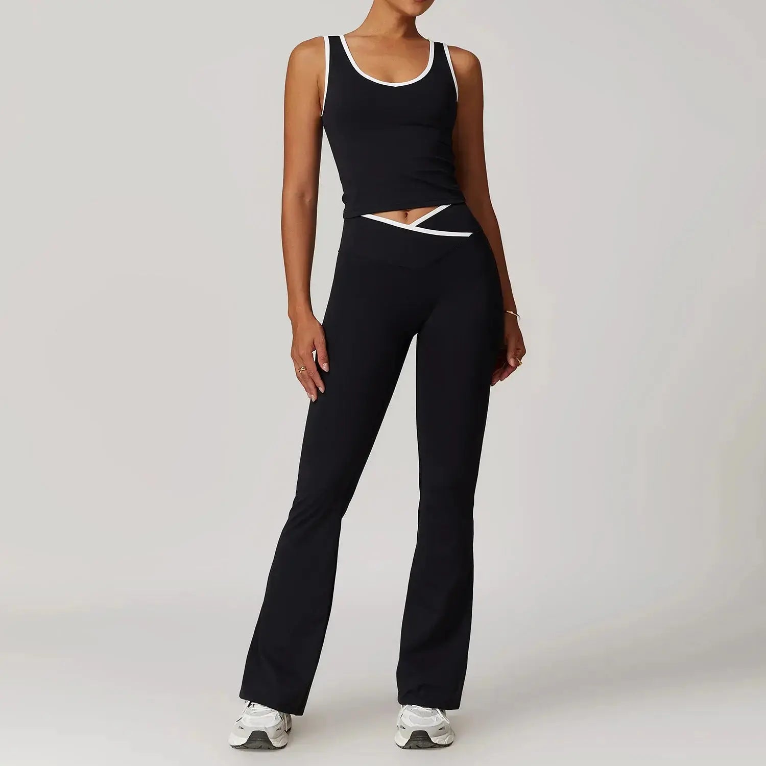 Women’s Hypes Inventory Flaire™ high waist yoga set with crossed design, perfect for fitness and workout sessions.