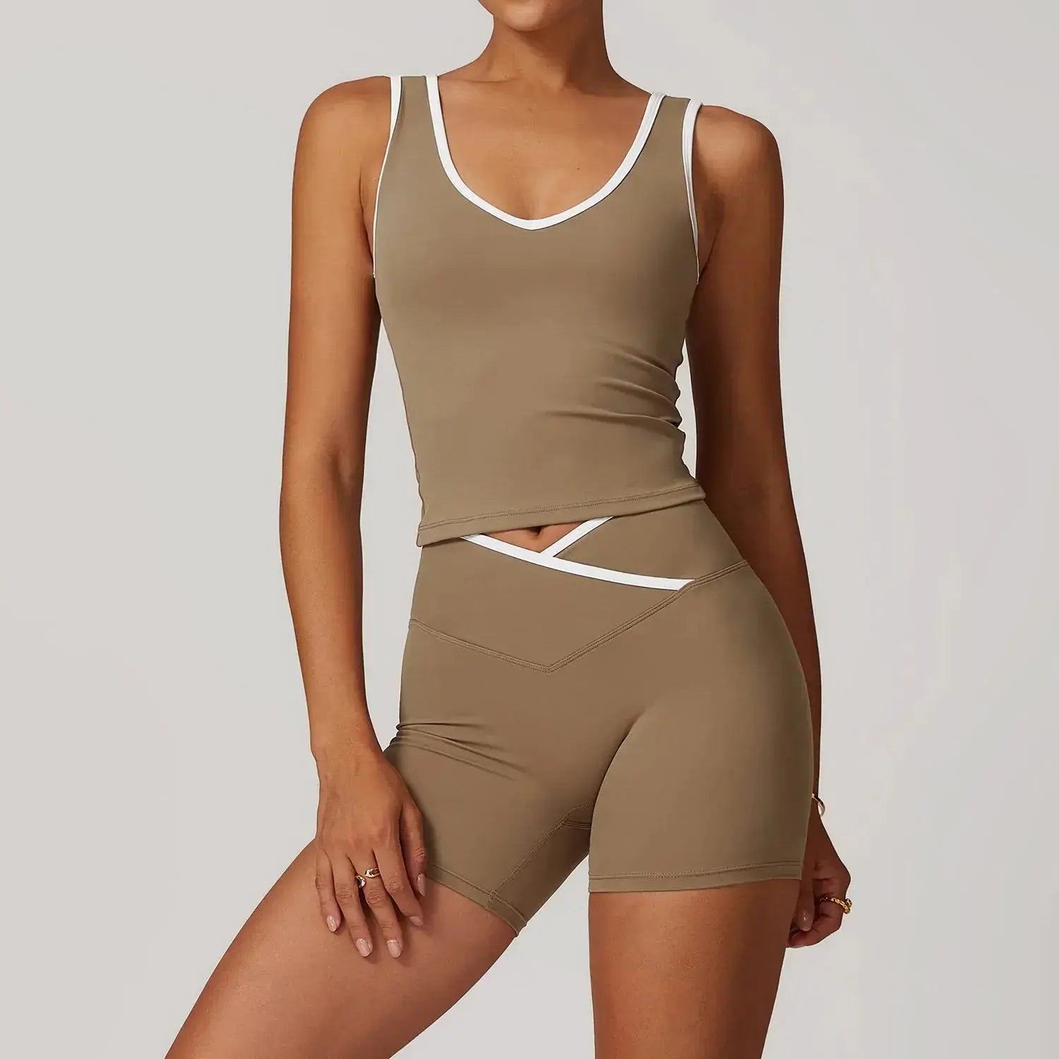Women’s Hypes Inventory Flaire™ Cross High Waist Yoga Set with matching sports bra and leggings, designed for fitness and workout sessions.