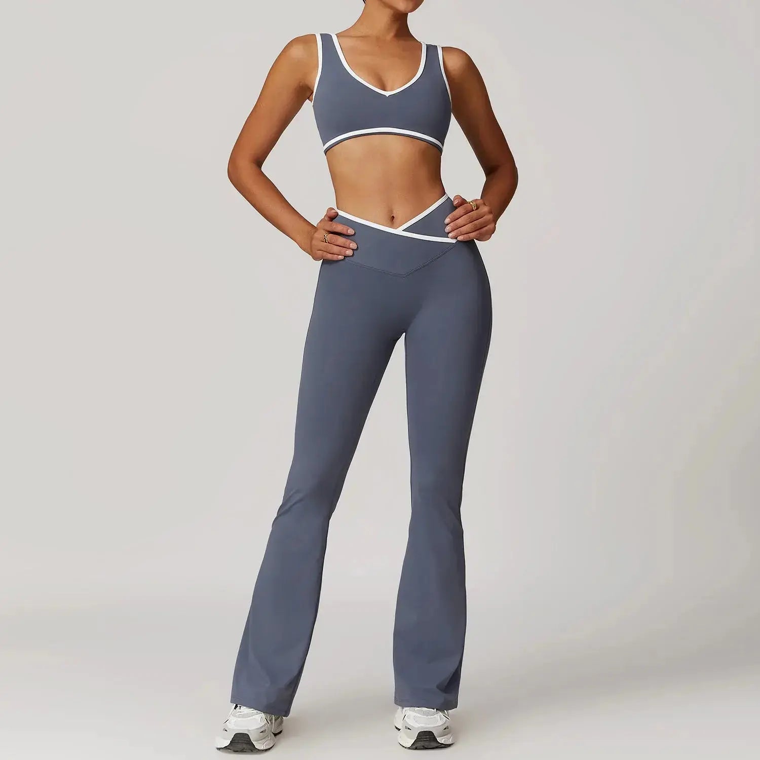 Women’s Flaire™ Cross High Waist Yoga Set by Hypes Inventory, featuring a stylish workout top and leggings for fitness and yoga.