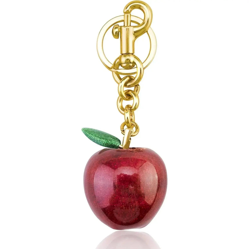 Hypes Inventory Apple-shaped keychain bag charm attached to a handbag, featuring a cute and aesthetic accessory for women.