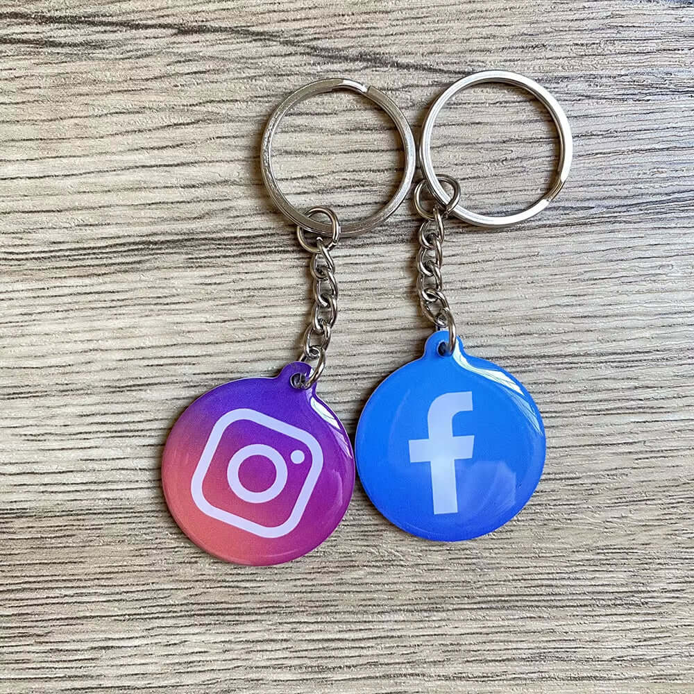 NFC keychain by Hypes Inventory showing a sleek metal design with embedded NFC chip for quick social media and contact sharing