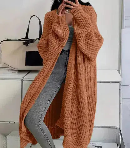 Women’s soft, loose-fit knitted cardigan coat by Hypes Inventory, featuring a cozy knit sweater jacket design.