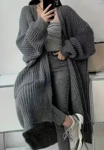 Women’s soft loose-fit knitted cardigan coat by Hypes Inventory, featuring a cozy knit sweater jacket with a relaxed fit.