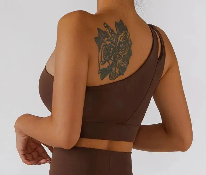 Hypes Inventory Flaire™ ribbed one-shoulder sports bra for workout, featuring a stylish, supportive design in black.