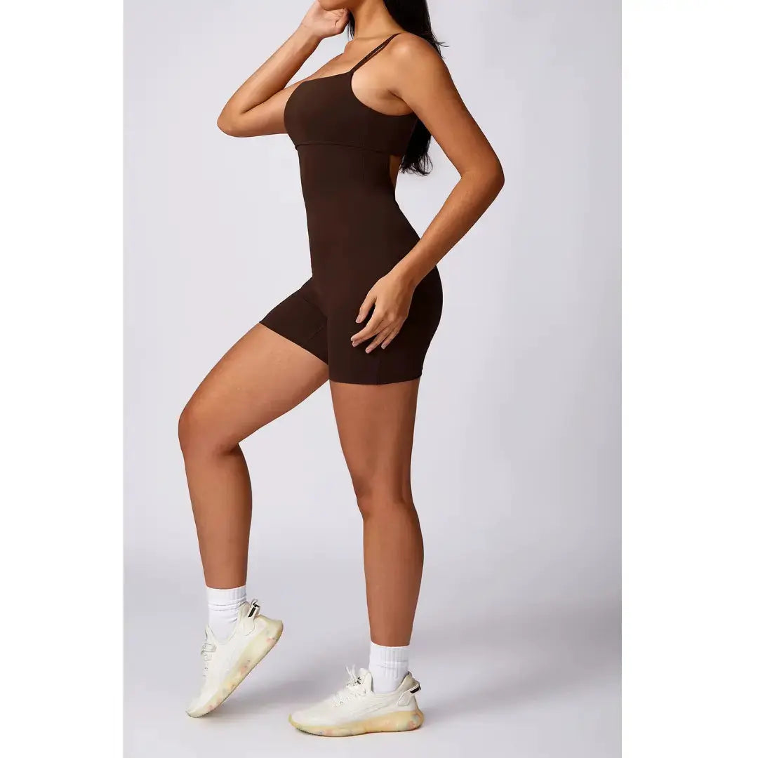 Black Flairé™ Seamless Yoga Jumpsuit by Hypes Inventory, close-up of the fitted one-piece activewear for women