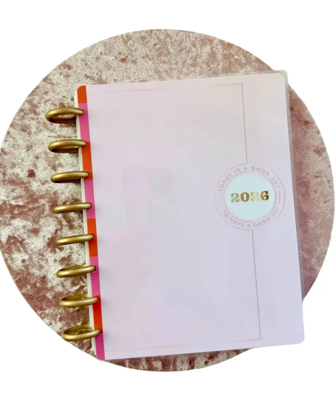 A5 Discbound 2026 Planner Weekly Monthly Journal by The Fabulous Planner, featuring colorful pages and a sleek design.