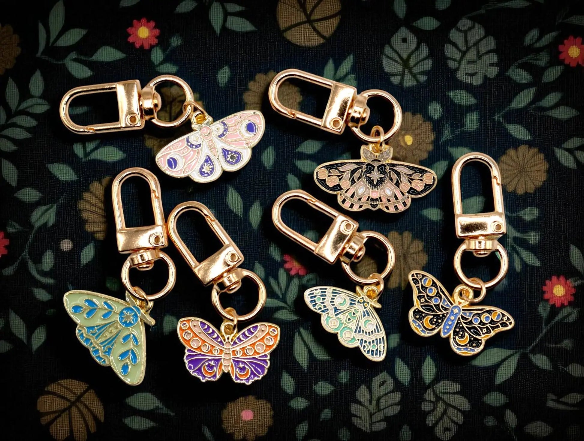 Celestial moth metal keychain and bag charm with butterfly design, from Why Begin, perfect as an aesthetic accessory.