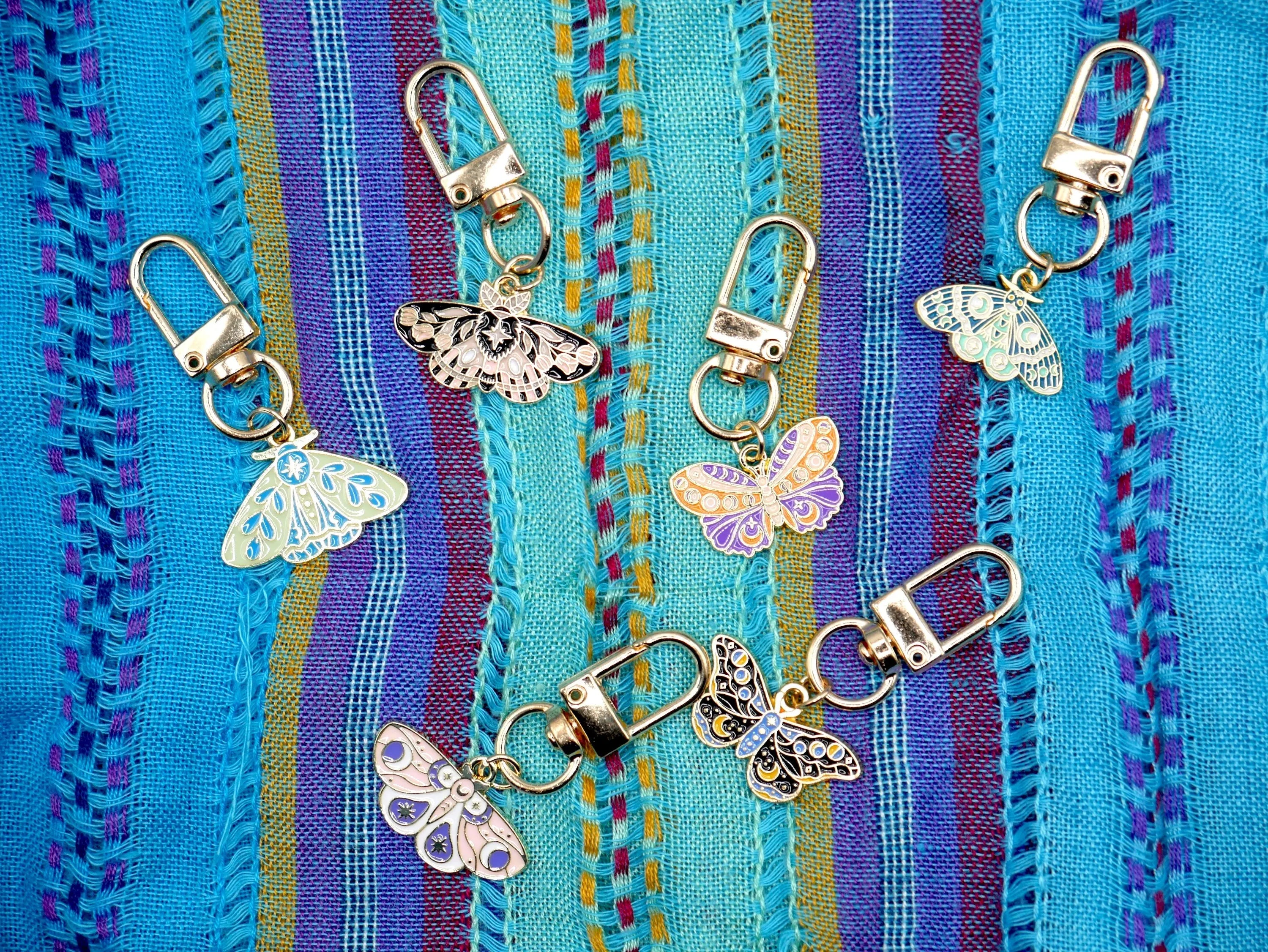 Metal Celestial Moth keychain and bag charm with intricate butterfly design, perfect as an aesthetic accessory.